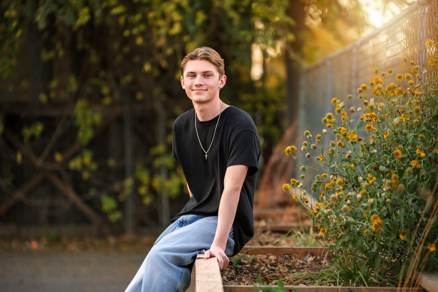 Smiling young man in casual attire.