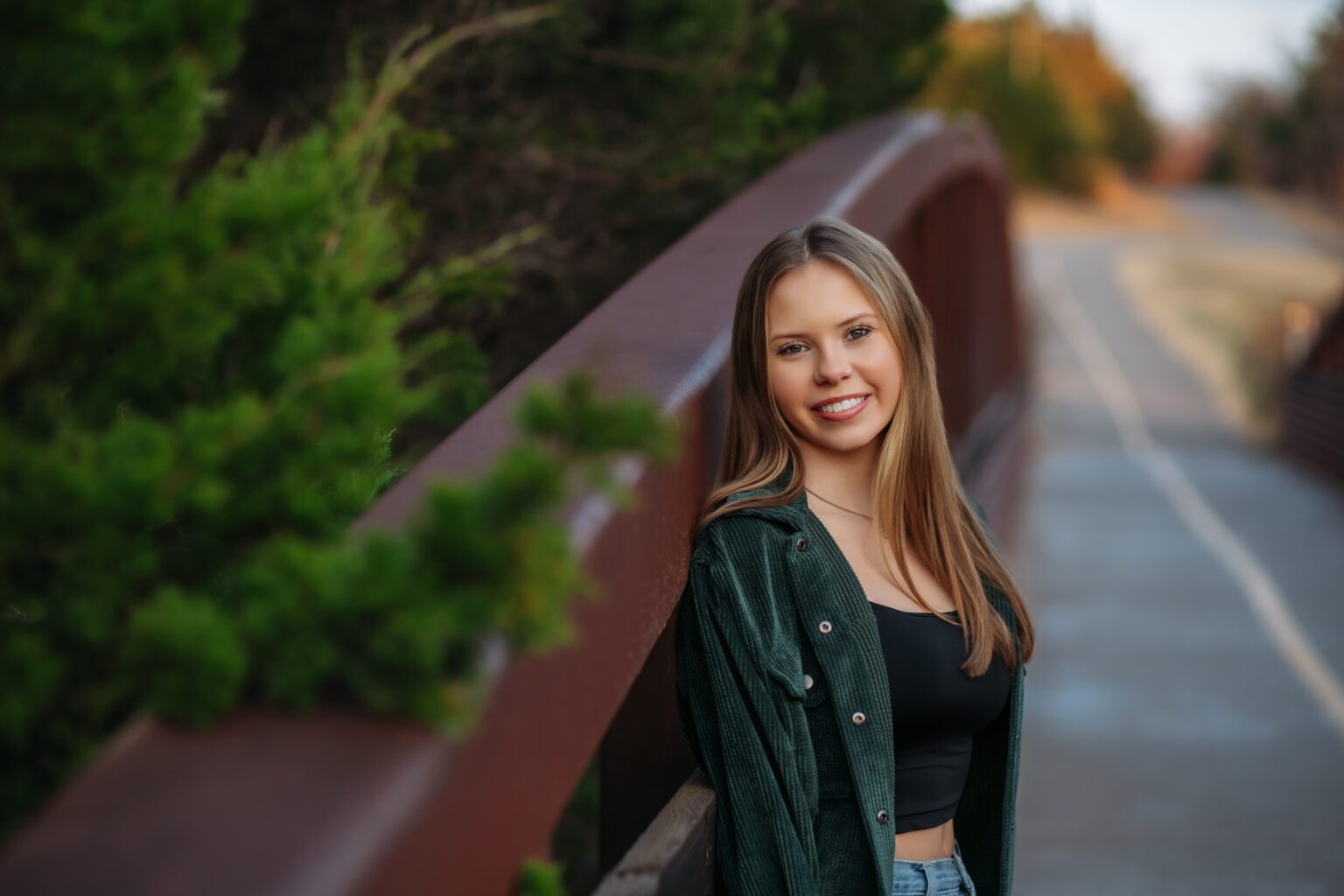 okc senior girl posing for her senior photos with missy mayo photography