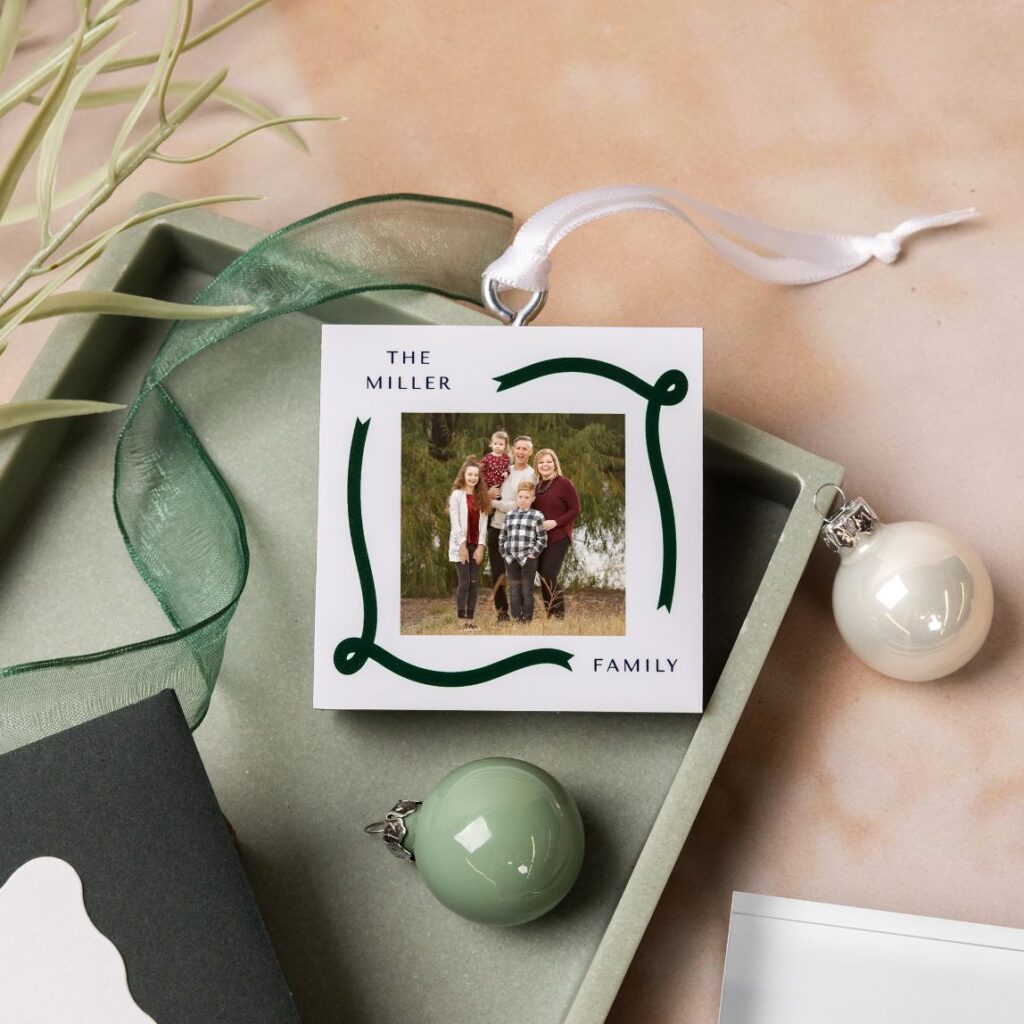 Personalized family photo Christmas ornament with a green ribbon border, a holiday photo gift idea from an Oklahoma City photographer